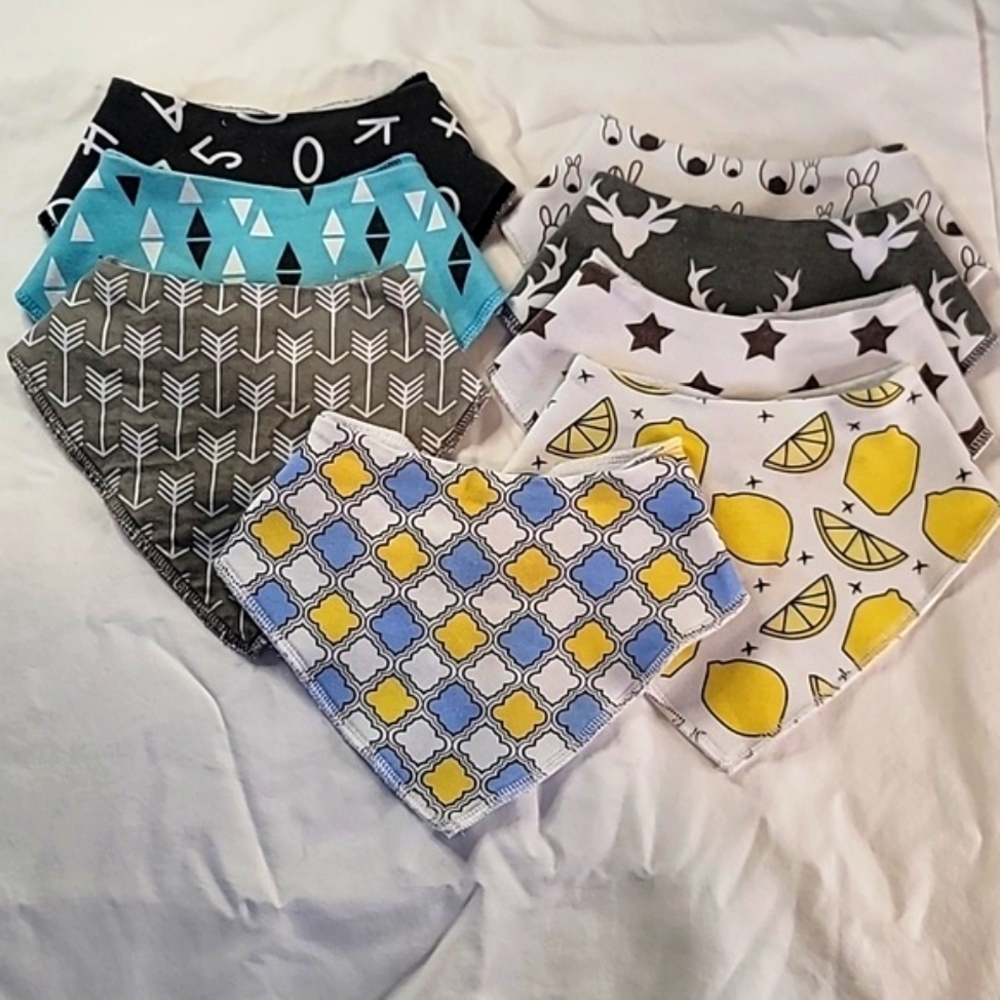 Bundle of 8 bibs, slight stains on a few